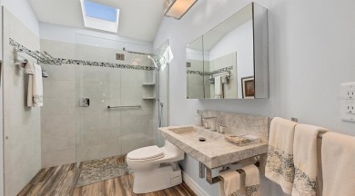 Beautifully updated villa with spectacular golf views in The on The Meadows Golf and Country Club in Florida - for sale on GolfHomes.com, golf home, golf lot