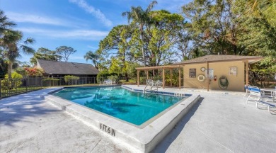 Beautifully updated villa with spectacular golf views in The on The Meadows Golf and Country Club in Florida - for sale on GolfHomes.com, golf home, golf lot