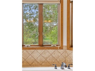 Step inside this beautiful two story home located in the heart on Edinburgh USA in Minnesota - for sale on GolfHomes.com, golf home, golf lot