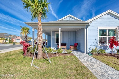 Charming Dreamsicle Cottage located in Latitude Daytona Beach on LPGA International Golf Course in Florida - for sale on GolfHomes.com, golf home, golf lot