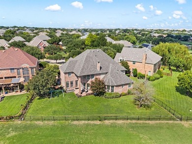 Welcome to this exquisite property! Nestled inside the on Hackberry Creek Country Club in Texas - for sale on GolfHomes.com, golf home, golf lot