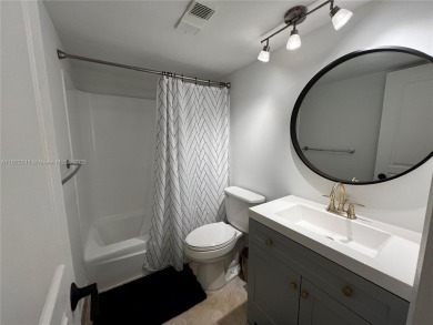 Exceptional value in prime East Boca Raton. Spacious 2 bed 2 on Royal Palm Yacht and Country Club in Florida - for sale on GolfHomes.com, golf home, golf lot