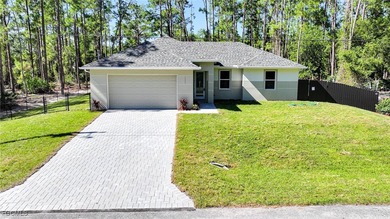 BRAND NEW CONSTRUCTION ON A 1/2 Acre Lot With A Fenced-In Back on Lehigh Resort Club in Florida - for sale on GolfHomes.com, golf home, golf lot