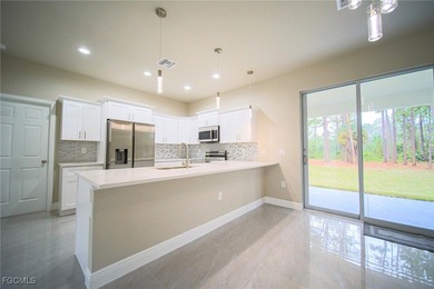 BRAND NEW CONSTRUCTION ON A 1/2 Acre Lot With A Fenced-In Back on Lehigh Resort Club in Florida - for sale on GolfHomes.com, golf home, golf lot