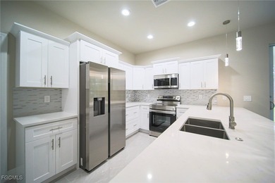 BRAND NEW CONSTRUCTION ON A 1/2 Acre Lot With A Fenced-In Back on Lehigh Resort Club in Florida - for sale on GolfHomes.com, golf home, golf lot