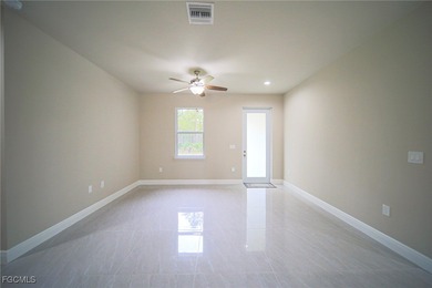 BRAND NEW CONSTRUCTION ON A 1/2 Acre Lot With A Fenced-In Back on Lehigh Resort Club in Florida - for sale on GolfHomes.com, golf home, golf lot