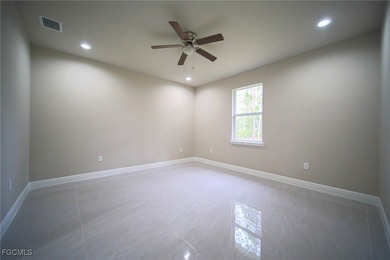 BRAND NEW CONSTRUCTION ON A 1/2 Acre Lot With A Fenced-In Back on Lehigh Resort Club in Florida - for sale on GolfHomes.com, golf home, golf lot