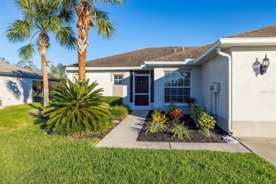 Under contract-accepting backup offers. A QUAINT MOVE-IN-READY on Tampa Bay Golf and Country Club in Florida - for sale on GolfHomes.com, golf home, golf lot