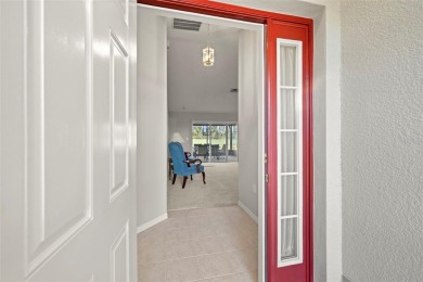 Under contract-accepting backup offers. A QUAINT MOVE-IN-READY on Tampa Bay Golf and Country Club in Florida - for sale on GolfHomes.com, golf home, golf lot