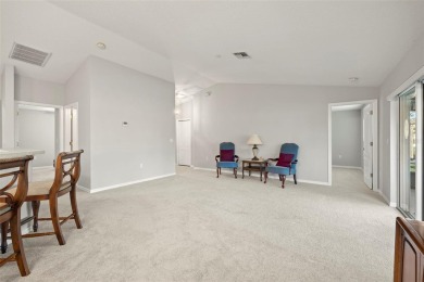 Under contract-accepting backup offers. A QUAINT MOVE-IN-READY on Tampa Bay Golf and Country Club in Florida - for sale on GolfHomes.com, golf home, golf lot
