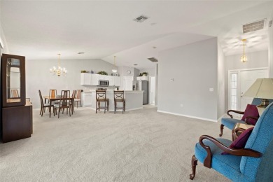 Under contract-accepting backup offers. A QUAINT MOVE-IN-READY on Tampa Bay Golf and Country Club in Florida - for sale on GolfHomes.com, golf home, golf lot