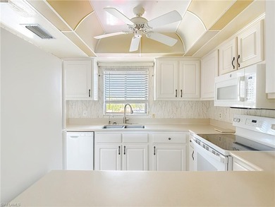 Prime second-floor 2-bedroom, 2-bath condo with in-residence on Royal Palm Golf Club in Florida - for sale on GolfHomes.com, golf home, golf lot