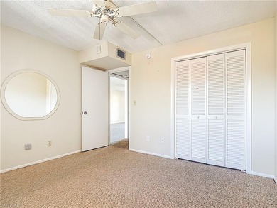 Prime second-floor 2-bedroom, 2-bath condo with in-residence on Royal Palm Golf Club in Florida - for sale on GolfHomes.com, golf home, golf lot