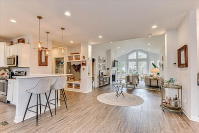 From the moment you step inside 121 Troon Way, the impact is on Houndslake Country Club in South Carolina - for sale on GolfHomes.com, golf home, golf lot