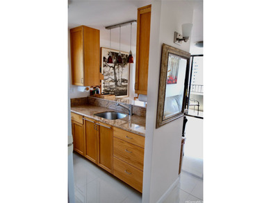 Completely remodeled corner unit in the heart of Waikiki on Ala Wai Golf Course in Hawaii - for sale on GolfHomes.com, golf home, golf lot