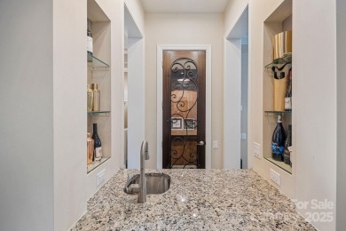 Situated on 1.64 acres w/golf course views, this home offers on Trump National Golf Club Charlotte in North Carolina - for sale on GolfHomes.com, golf home, golf lot