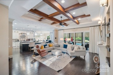 Situated on 1.64 acres w/golf course views, this home offers on Trump National Golf Club Charlotte in North Carolina - for sale on GolfHomes.com, golf home, golf lot
