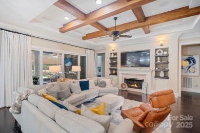 Situated on 1.64 acres w/golf course views, this home offers on Trump National Golf Club Charlotte in North Carolina - for sale on GolfHomes.com, golf home, golf lot