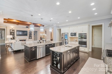Situated on 1.64 acres w/golf course views, this home offers on Trump National Golf Club Charlotte in North Carolina - for sale on GolfHomes.com, golf home, golf lot