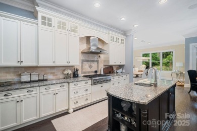 Situated on 1.64 acres w/golf course views, this home offers on Trump National Golf Club Charlotte in North Carolina - for sale on GolfHomes.com, golf home, golf lot
