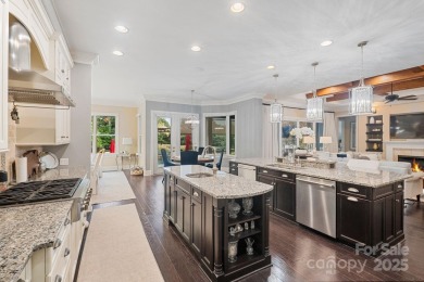 Situated on 1.64 acres w/golf course views, this home offers on Trump National Golf Club Charlotte in North Carolina - for sale on GolfHomes.com, golf home, golf lot