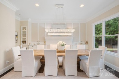 Situated on 1.64 acres w/golf course views, this home offers on Trump National Golf Club Charlotte in North Carolina - for sale on GolfHomes.com, golf home, golf lot
