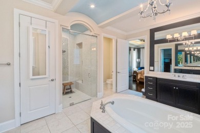Situated on 1.64 acres w/golf course views, this home offers on Trump National Golf Club Charlotte in North Carolina - for sale on GolfHomes.com, golf home, golf lot