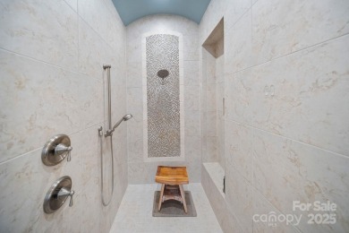 Situated on 1.64 acres w/golf course views, this home offers on Trump National Golf Club Charlotte in North Carolina - for sale on GolfHomes.com, golf home, golf lot