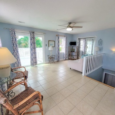 Gorgeous views from this tri-level 2nd row beach home. Lots of on The Plantation Course At Edisto in South Carolina - for sale on GolfHomes.com, golf home, golf lot