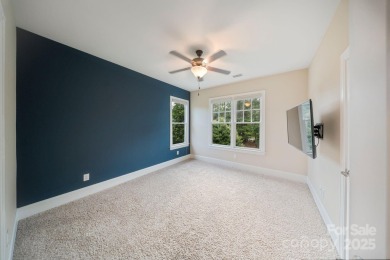 Situated on 1.64 acres w/golf course views, this home offers on Trump National Golf Club Charlotte in North Carolina - for sale on GolfHomes.com, golf home, golf lot