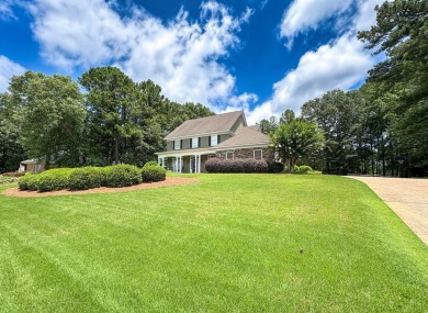 Welcome to 4880 Turnberry Lane - a Southern charmer with on Maple Ridge Golf Club in Georgia - for sale on GolfHomes.com, golf home, golf lot