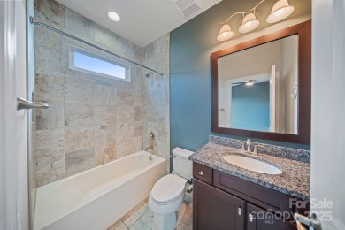 Situated on 1.64 acres w/golf course views, this home offers on Trump National Golf Club Charlotte in North Carolina - for sale on GolfHomes.com, golf home, golf lot