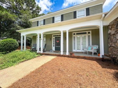 Welcome to 4880 Turnberry Lane - a Southern charmer with on Maple Ridge Golf Club in Georgia - for sale on GolfHomes.com, golf home, golf lot