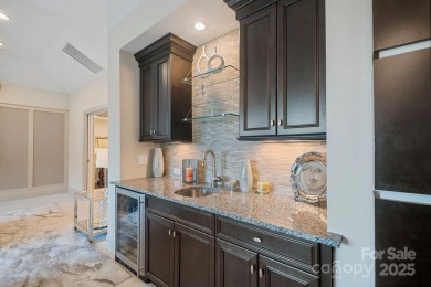 Situated on 1.64 acres w/golf course views, this home offers on Trump National Golf Club Charlotte in North Carolina - for sale on GolfHomes.com, golf home, golf lot