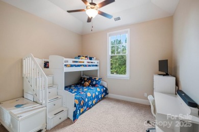 Situated on 1.64 acres w/golf course views, this home offers on Trump National Golf Club Charlotte in North Carolina - for sale on GolfHomes.com, golf home, golf lot