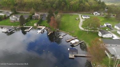 2 BUILDABLE LAKEFRONT LOTS- PRACTICALLY FLAT, BEAUTIFUL SETTING on Scranton Canoe Club in Pennsylvania - for sale on GolfHomes.com, golf home, golf lot