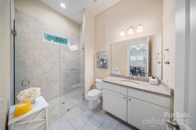 Situated on 1.64 acres w/golf course views, this home offers on Trump National Golf Club Charlotte in North Carolina - for sale on GolfHomes.com, golf home, golf lot