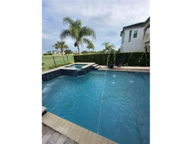 Pristine 5-Bedroom, 5.5-Bath Home boasting 3,328 Sq. Ft. of on Reunion Resort Golf Course in Florida - for sale on GolfHomes.com, golf home, golf lot