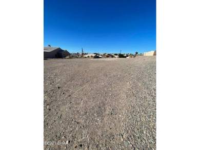 Build on this expansive lot, this property offers ample space to on London Bridge Golf Course in Arizona - for sale on GolfHomes.com, golf home, golf lot