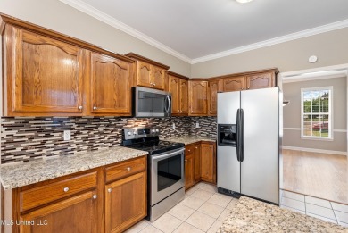 This beautifully maintained brick home boasts 4 bedrooms, 3 on Cherokee Valley Golf Course in Mississippi - for sale on GolfHomes.com, golf home, golf lot
