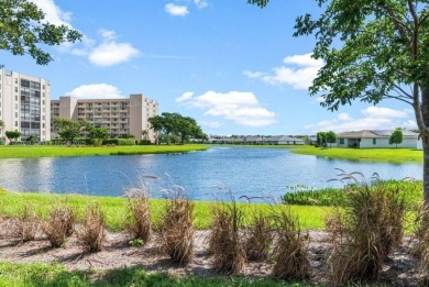 Light, bright & spacious 2 bed/2 bath beautiful home w/lake on Marina Lakes Golf Course in Florida - for sale on GolfHomes.com, golf home, golf lot