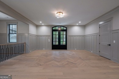 New Construction Masterpiece, nestled on Hole #1 of The Cove in on Reynolds Lake Oconee - The National  in Georgia - for sale on GolfHomes.com, golf home, golf lot