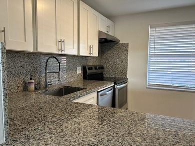 Spacious 2BR/2BA condo in the peaceful 55+ community of Oriole on Oriole Golf and Tennis Club in Florida - for sale on GolfHomes.com, golf home, golf lot