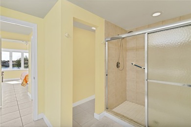 Enjoy stunning views of the aqua range and 9th fairway from this on Oak Harbor Country Club in Florida - for sale on GolfHomes.com, golf home, golf lot