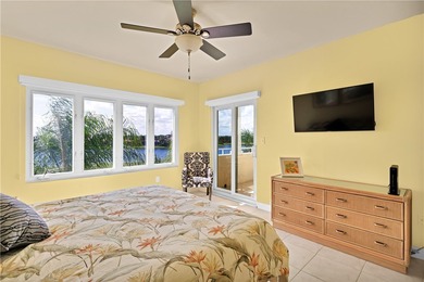 Enjoy stunning views of the aqua range and 9th fairway from this on Oak Harbor Country Club in Florida - for sale on GolfHomes.com, golf home, golf lot