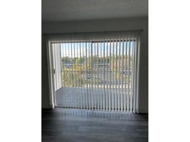 Spacious 2BR/2BA condo in the peaceful 55+ community of Oriole on Oriole Golf and Tennis Club in Florida - for sale on GolfHomes.com, golf home, golf lot