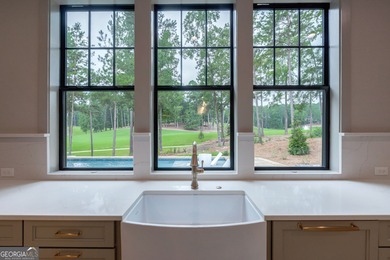 New Construction Masterpiece, nestled on Hole #1 of The Cove in on Reynolds Lake Oconee - The National  in Georgia - for sale on GolfHomes.com, golf home, golf lot