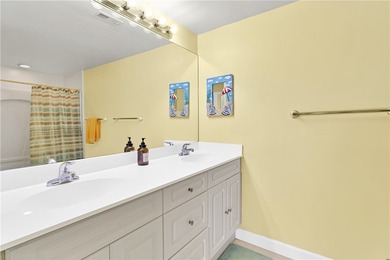 Enjoy stunning views of the aqua range and 9th fairway from this on Oak Harbor Country Club in Florida - for sale on GolfHomes.com, golf home, golf lot