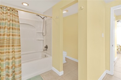 Enjoy stunning views of the aqua range and 9th fairway from this on Oak Harbor Country Club in Florida - for sale on GolfHomes.com, golf home, golf lot