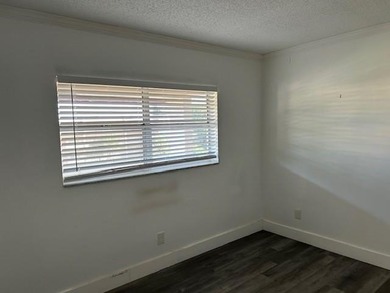 Spacious 2BR/2BA condo in the peaceful 55+ community of Oriole on Oriole Golf and Tennis Club in Florida - for sale on GolfHomes.com, golf home, golf lot